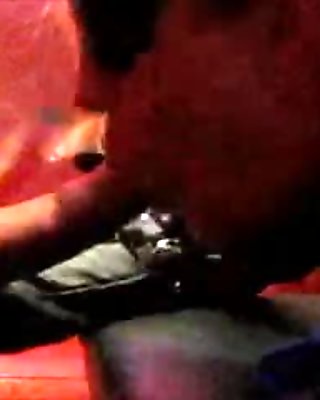 Leather porn video in which a latex bitch sucks a rod
