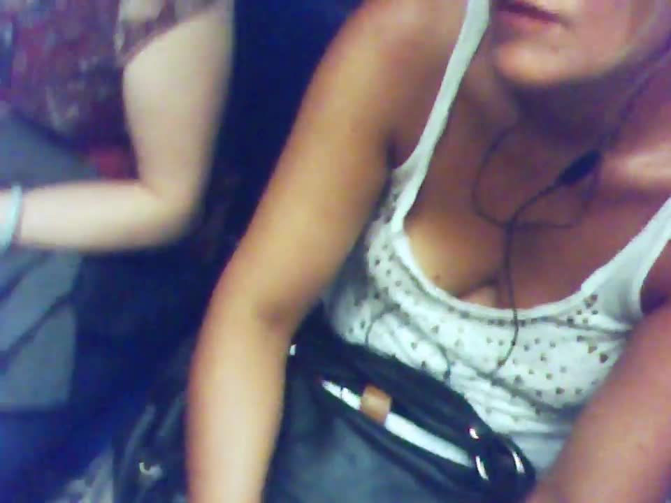 downblouse braless in Paris subway