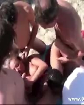 French mature gangbanged on the beach