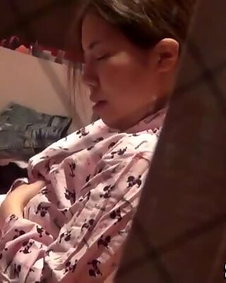 Asian teenager rubs pussy